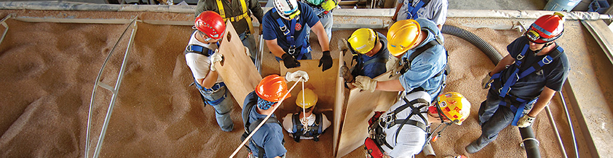 Group of people practicing grain bin rescue