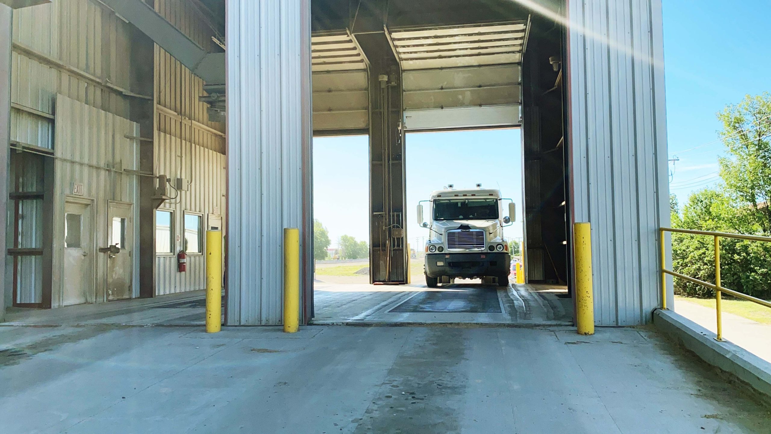 Semi pulling into grain facility