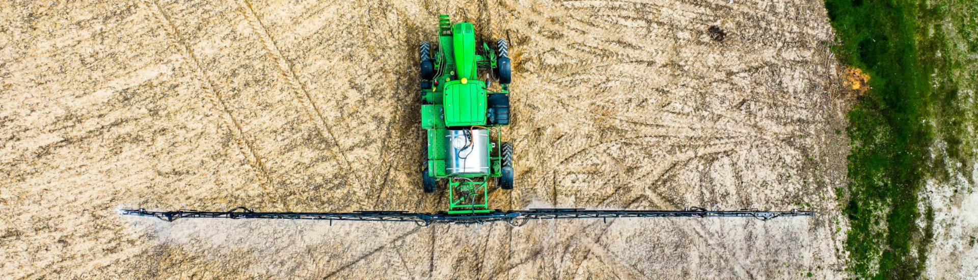 Sprayer putting down crop nutrients