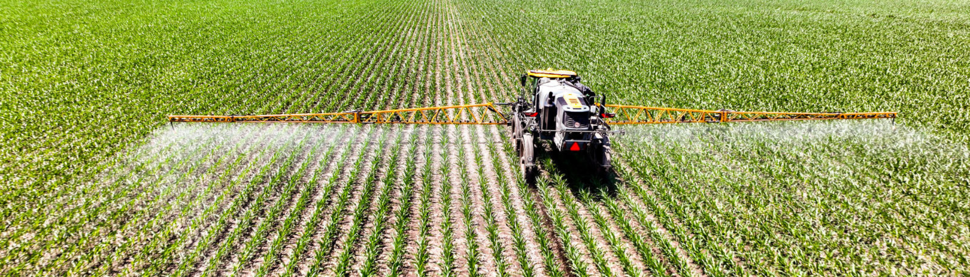 Sprayer putting down crop protection