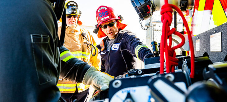 Two firefighters training.